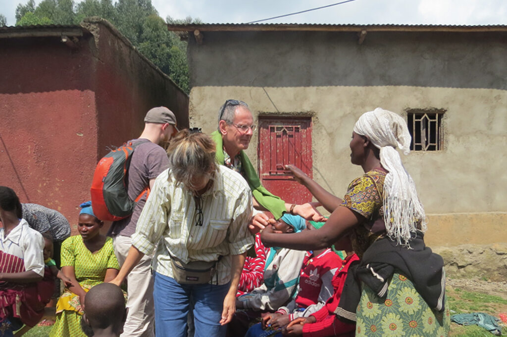 Volunteer with the community during Umuganda.